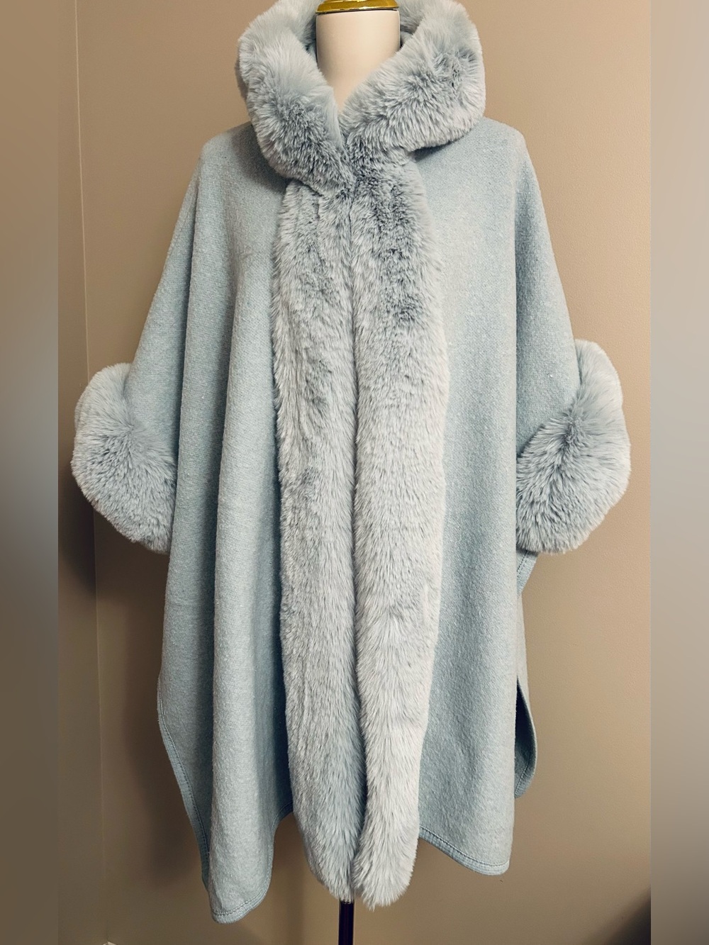 100% Viscose Faux Fur Trimmed Hooded Poncho in Icy Blue